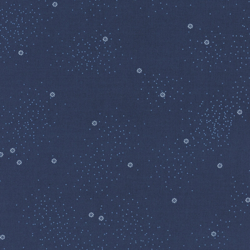 A navy-blue fabric with small white daisies and little white speckles throughout