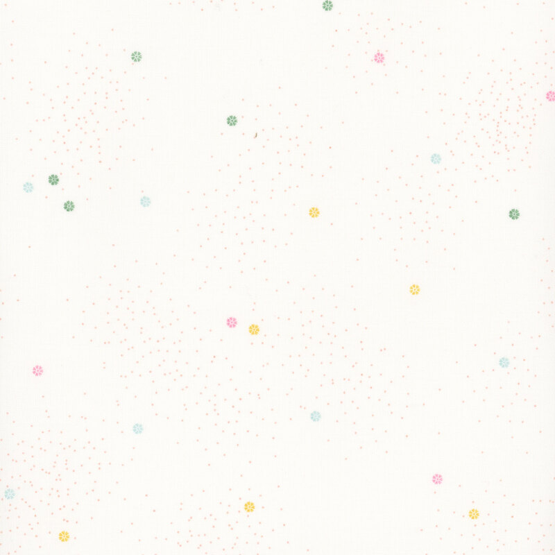 A white fabric with small multi-colored daisies and speckles throughout