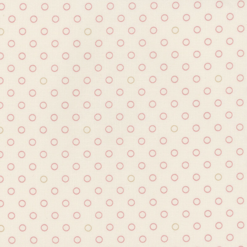 A light cream fabric with small, evenly spaced red and tan rings