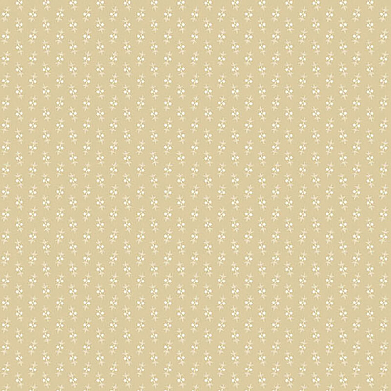 Light tan fabric with small alternating floral decorations