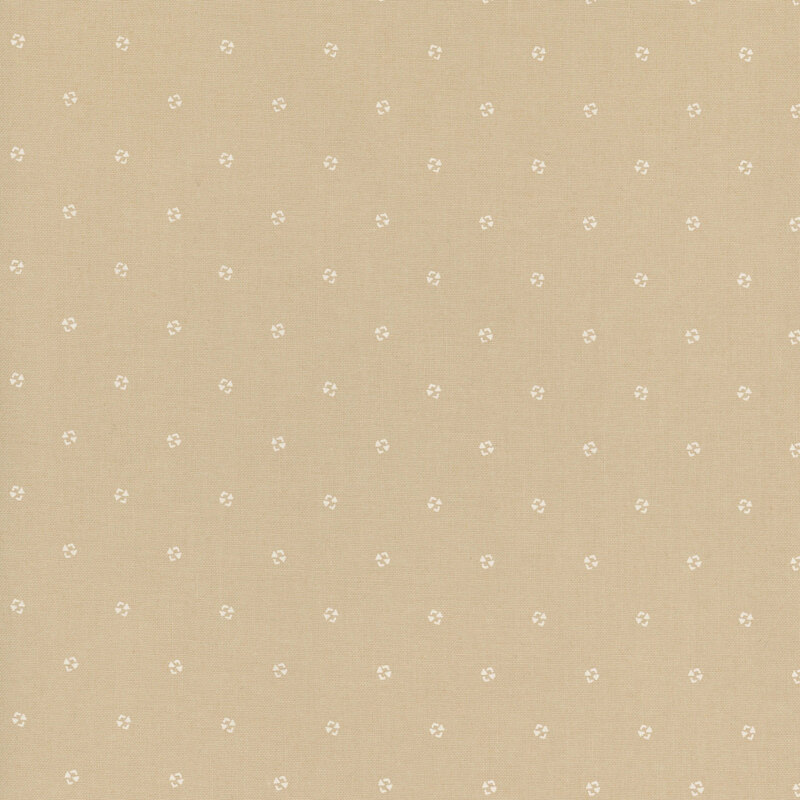 Light tan fabric with tiny white floral decorations