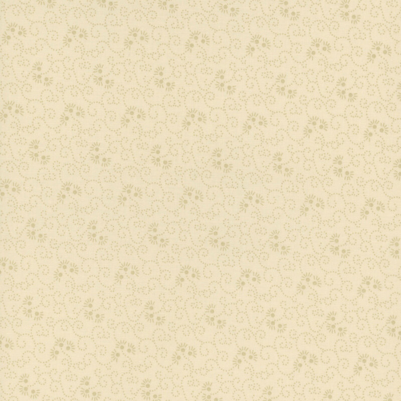 Light tan fabric covered in swirling dotted lines and small florals