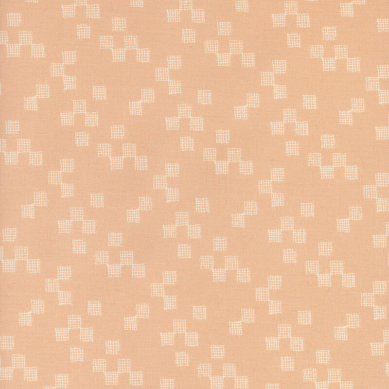 Peach fabric featuring many small square grids