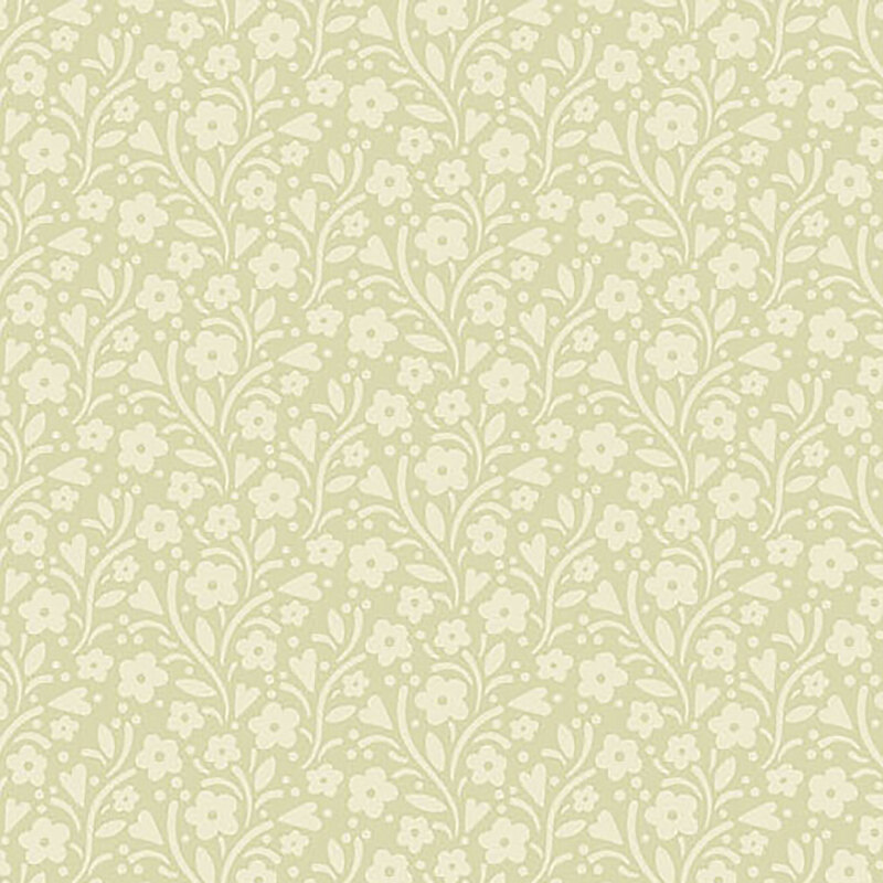 Tonal light tan fabric with light cream leaves, vines, and florals all over