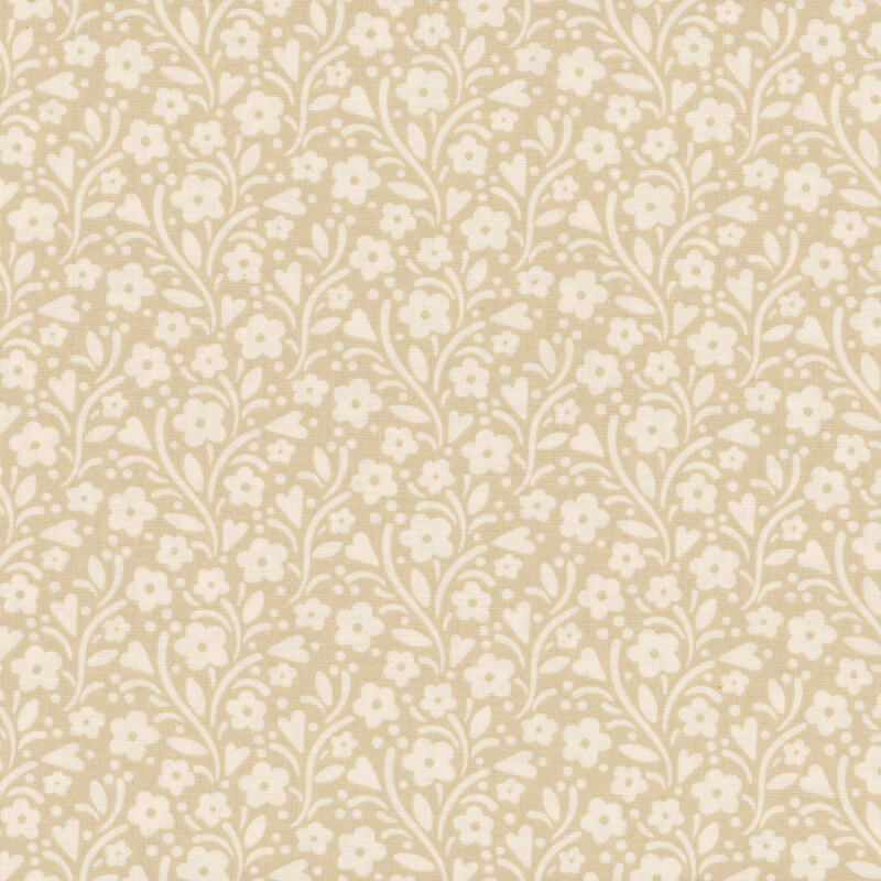 Tonal light tan fabric with light cream leaves, vines, and florals all over