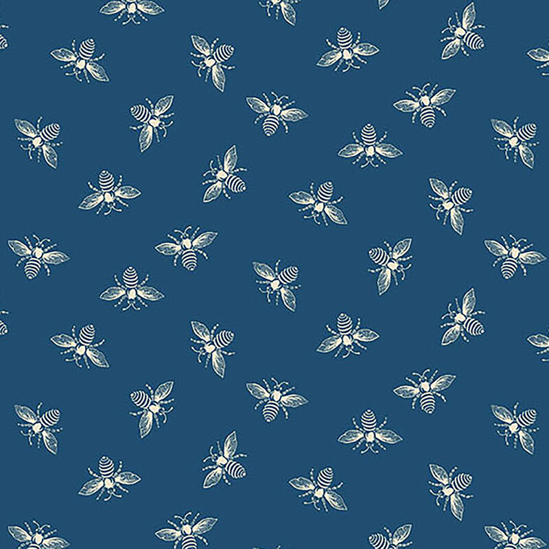 Navy blue fabric with light cream ditsy bees all over.