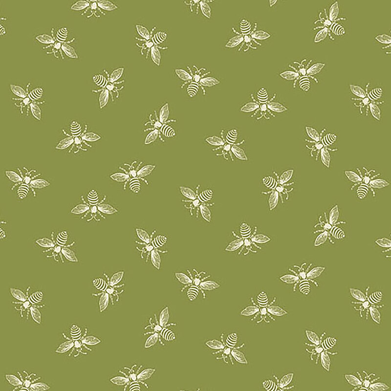 Grass green fabric with off-white ditsy bees all over.