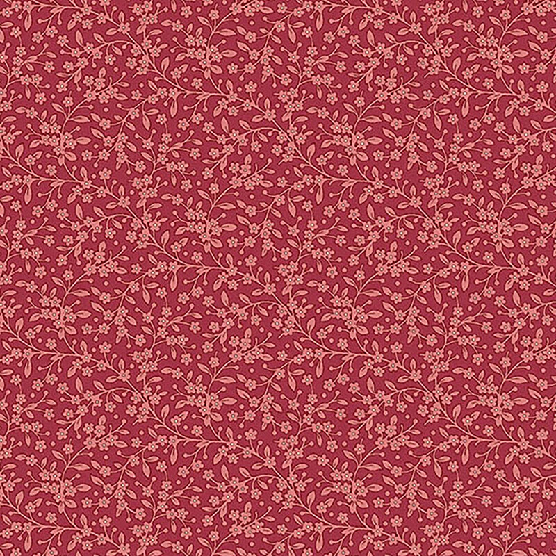 Tonal raspberry-red fabric with light red leaves and vines all over.