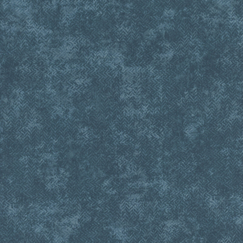 A mottled, denim-colored fabric with zig-zag texturing