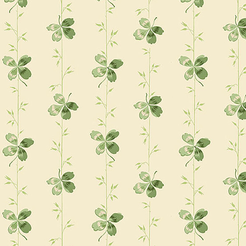 A light cream fabric with green stripes made of vines and clovers