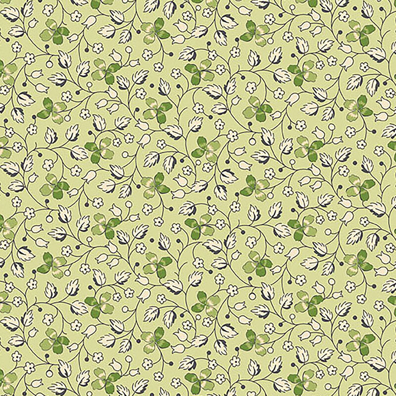 Light green fabric with creeping vines, leaves, and clovers throughout