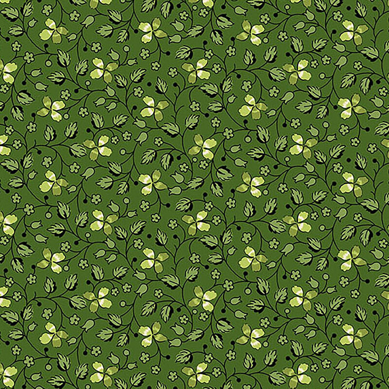 Green fabric with creeping vines, florals, and clover throughout