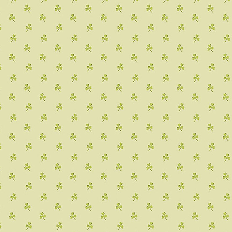 Light green fabric with dark green, evenly spaced clovers all over