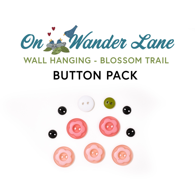 The 11 colorful buttons included in the Blossom Trail button pack, isolated on a white background.