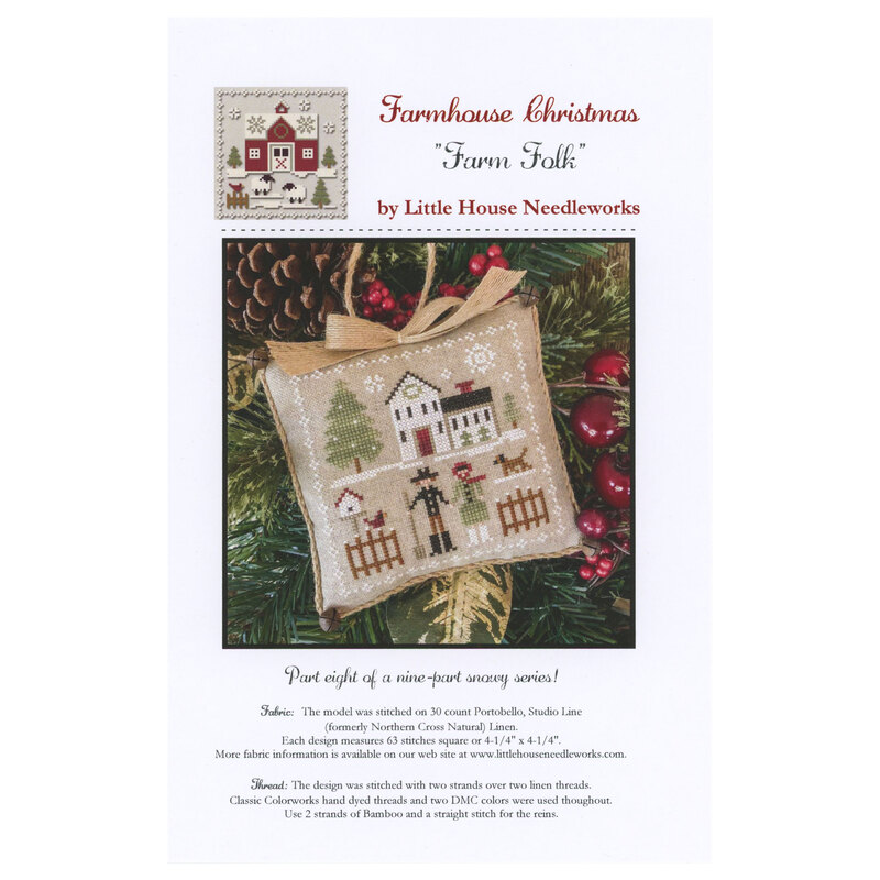 Front of pattern showing the completed small cross stitch ornament staged on the branch of a Christmas tree