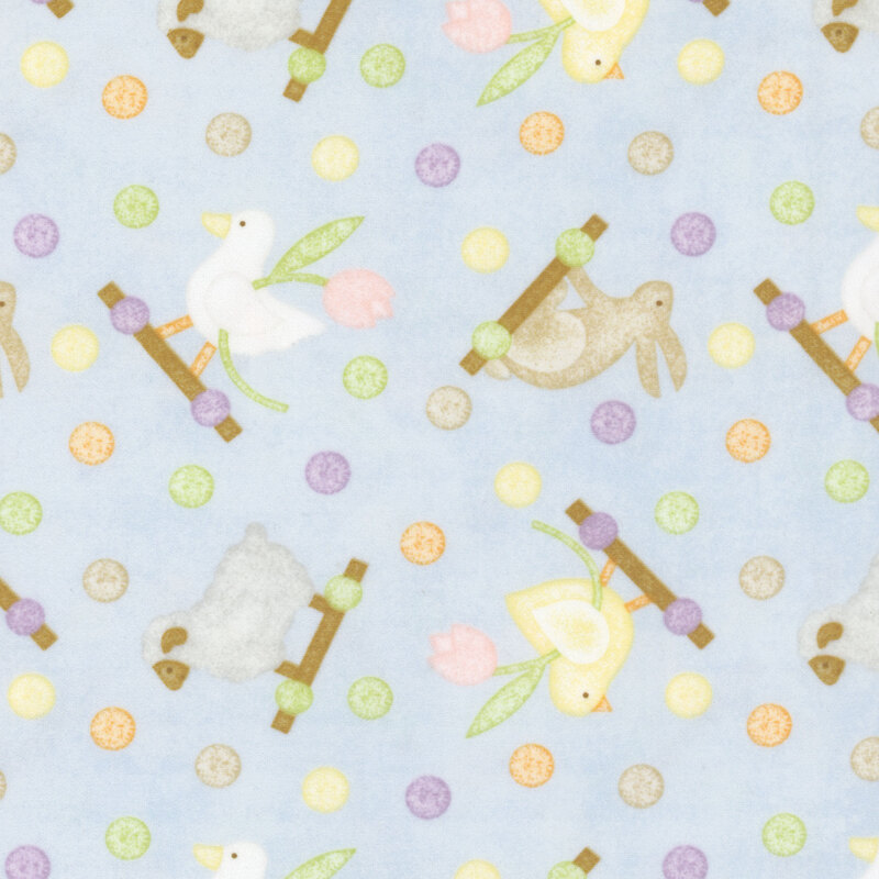 soft pastel blue fabric featuring chicks, ducks, bunnies, and sheep with multicolored dots.