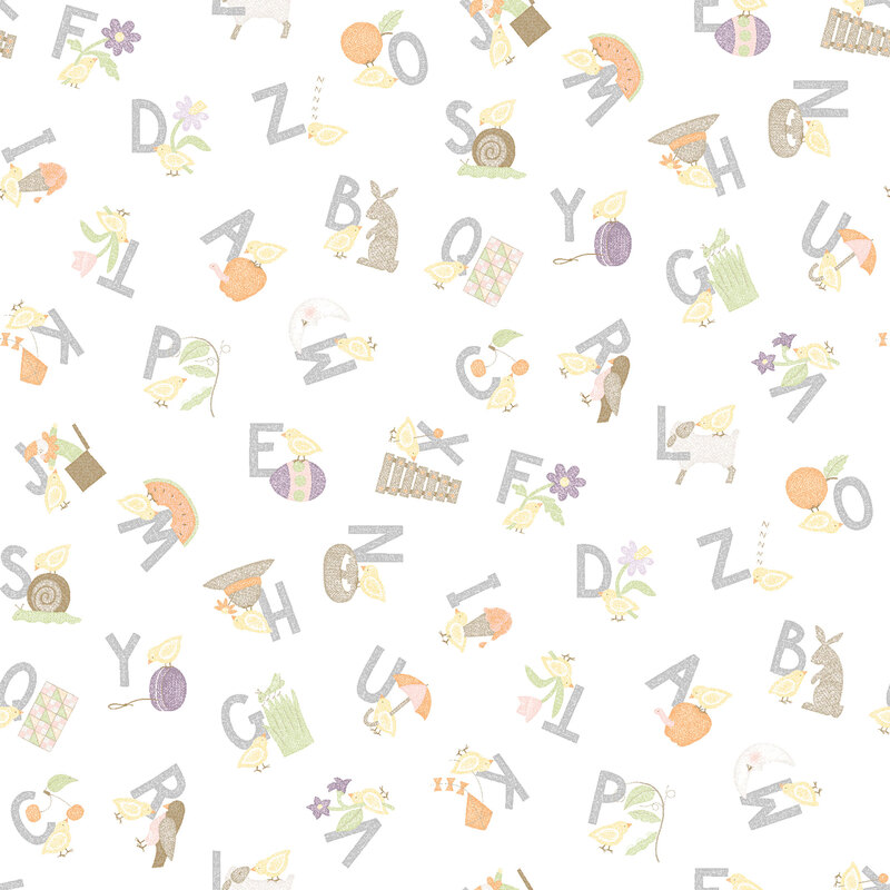 soft white fabric featuring the alphabet with corresponding images for each letter