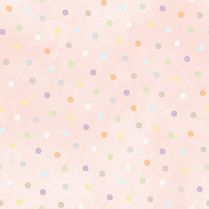soft pastel pink fabric featuring pastel multicolored polka dots