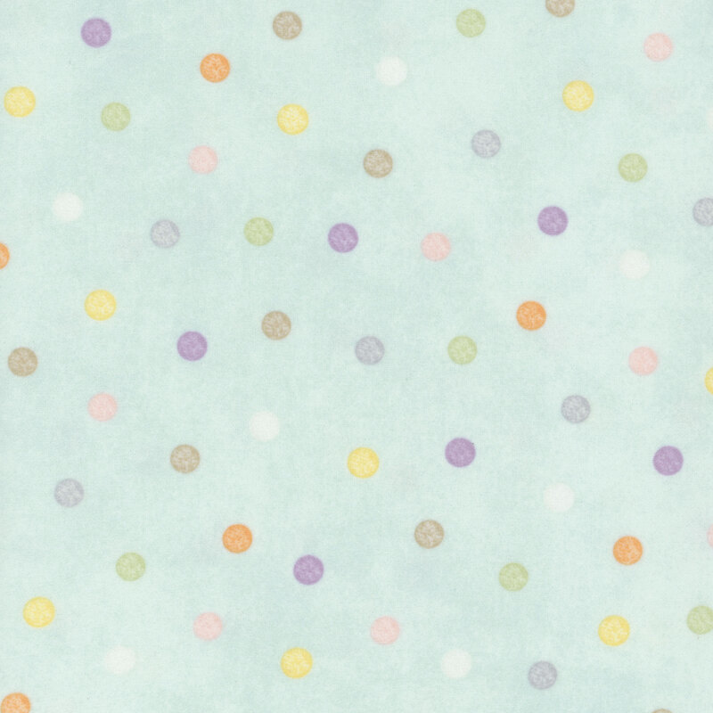 soft pastel aqua fabric featuring pastel multicolored polka dots.