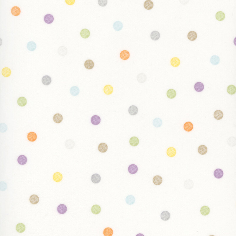 soft white fabric featuring pastel multicolored polka dots.