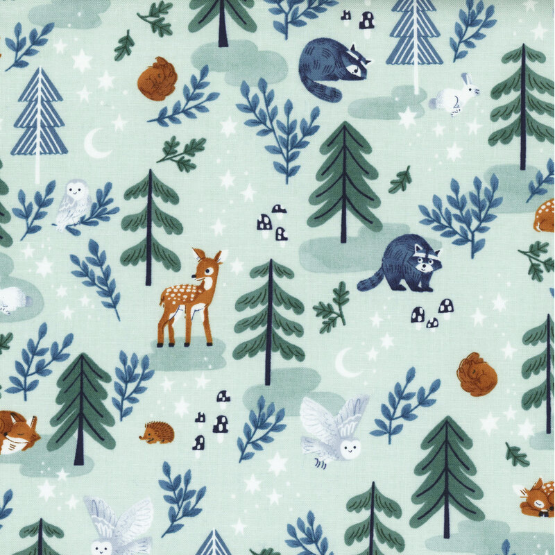 light aqua fabric featuring a forest with wildlife animals