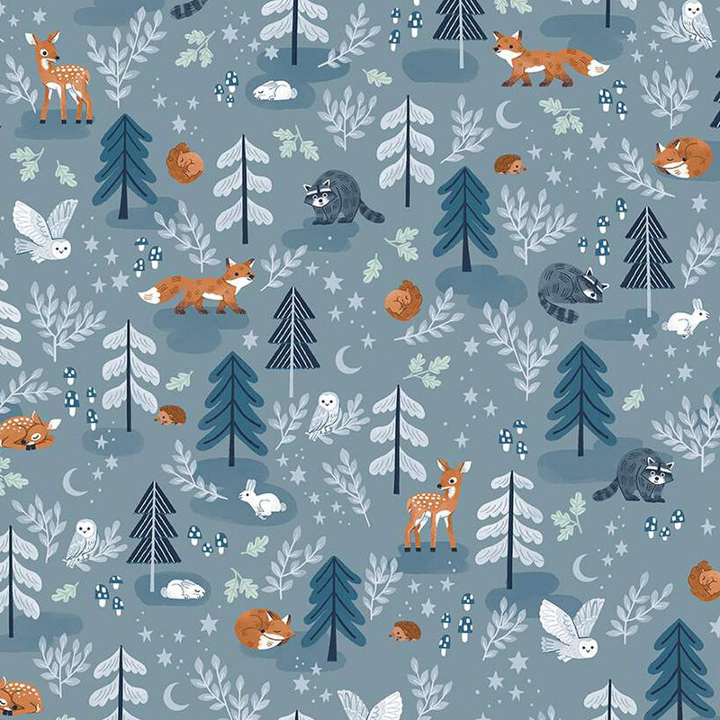 blue fabric featuring a forest with wildlife animals