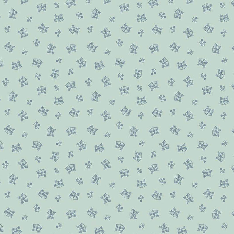 light aqua fabric featuring tossed raccoon heads and sprigs