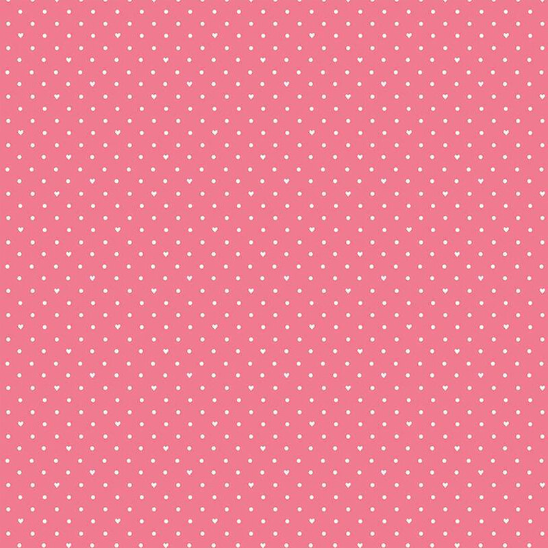 Light pink fabric with small white polka dots and hearts throughout