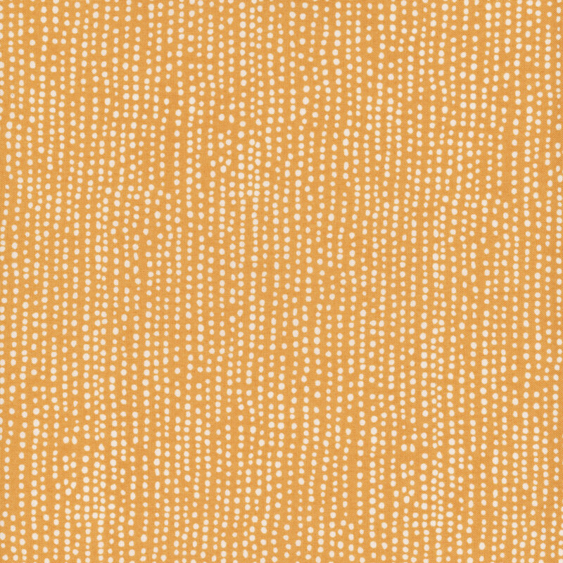 Tan fabric with small white dots all over