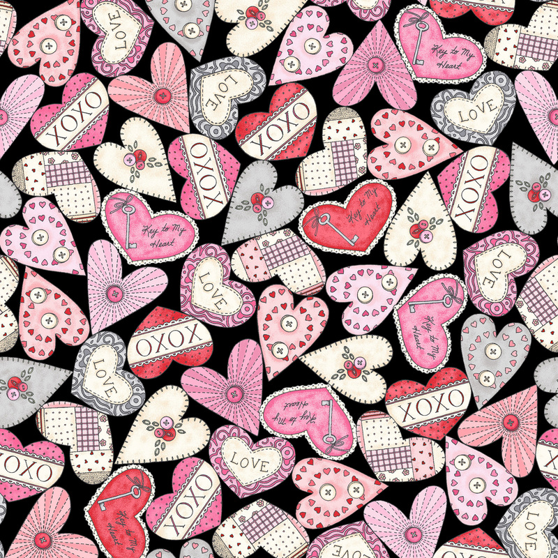 Black fabric with red, pink, and white hearts with fun sayings