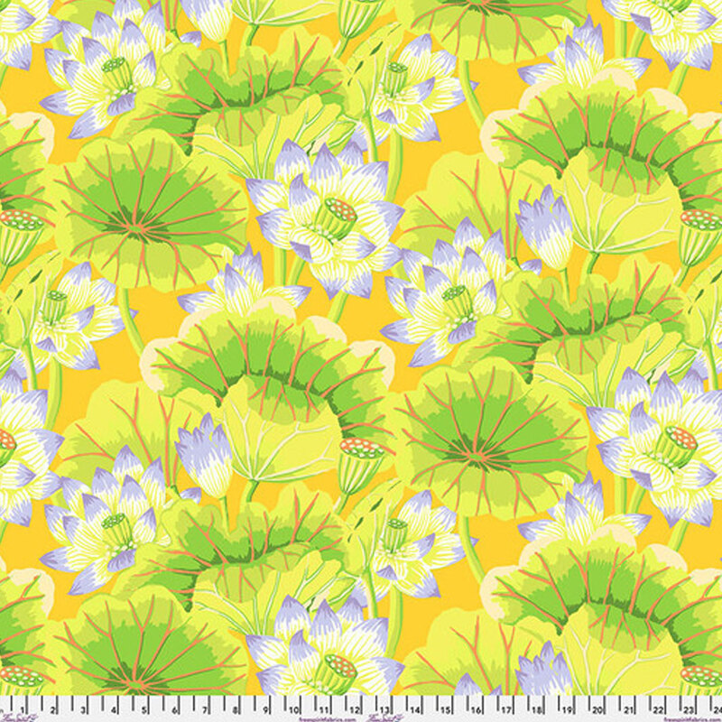 Bright yellow fabric with green lake blossoms and white florals throughout