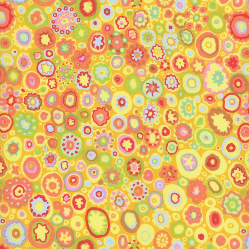 Intricate yellow fabric with bright red, yellow, orange, and green spots of various shapes and sizes all over