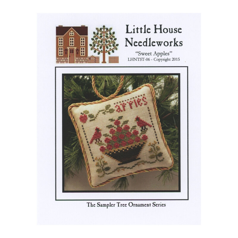 The front cover of the pattern, showing the chart finished into an embellished ornament.