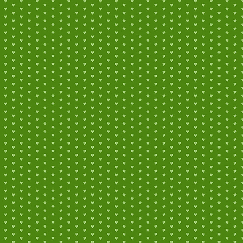 Green fabric with a pattern of mini light green hearts