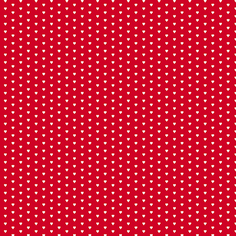 Bright red fabric with a pattern of mini white hearts