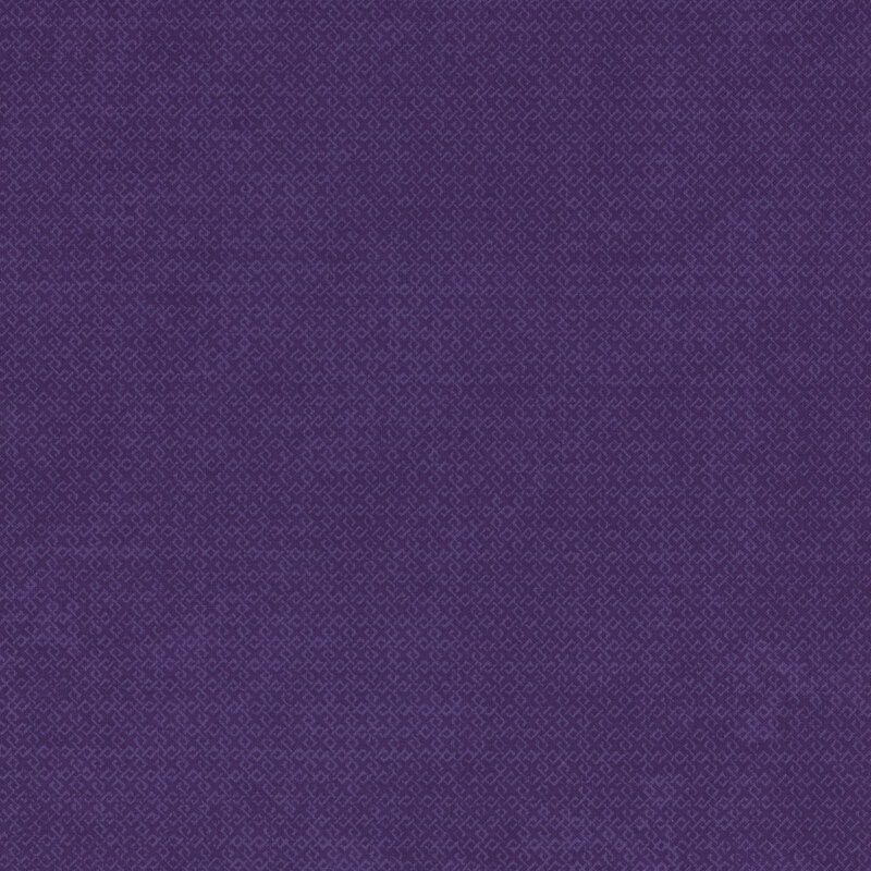 textured purple fabric with a light purple lattice design