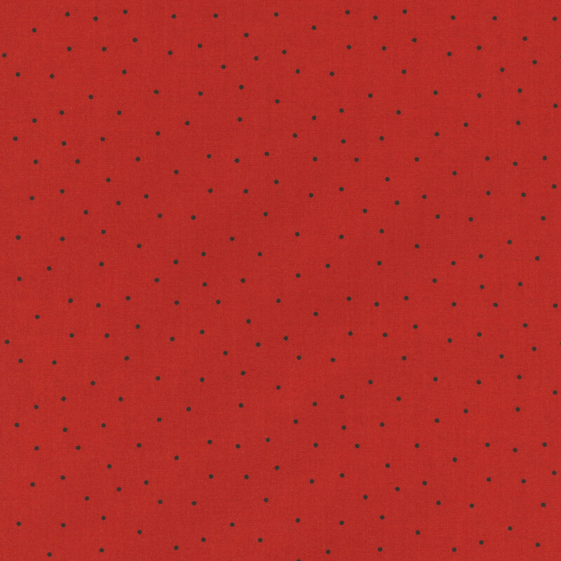 Barn red fabric with scattered black pin dots