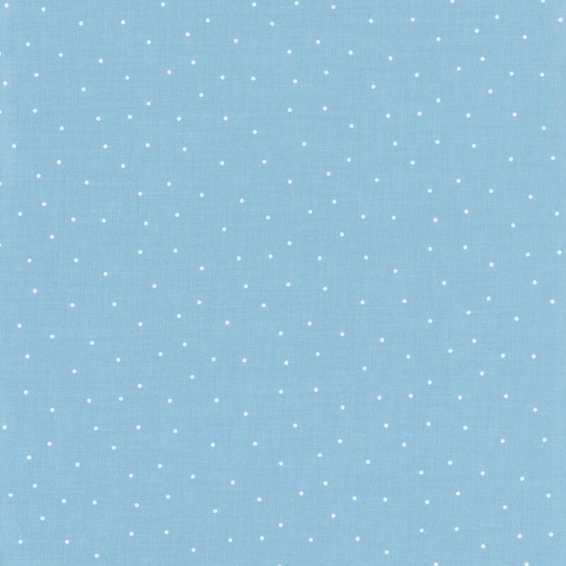 Baby blue fabric with scattered white dots