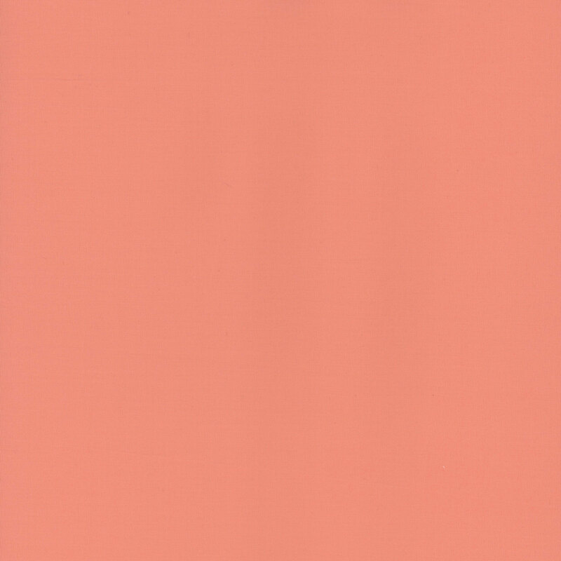 Solid coral peach fabric