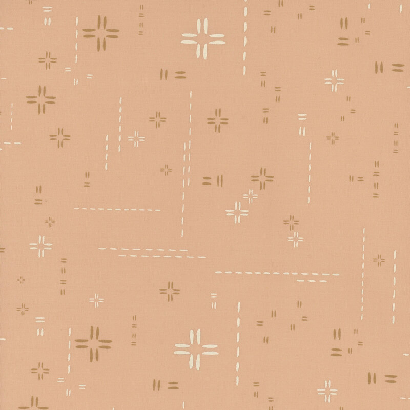 tan fabric featuring decorative stitch marks