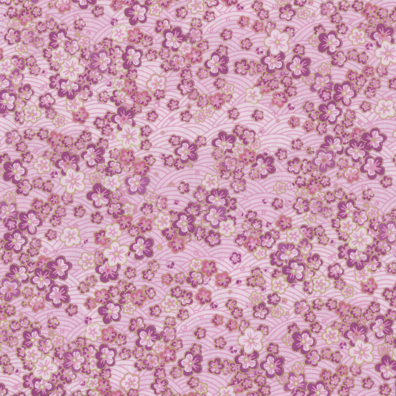 Light pink fabric covered in small purple cherry blossoms .