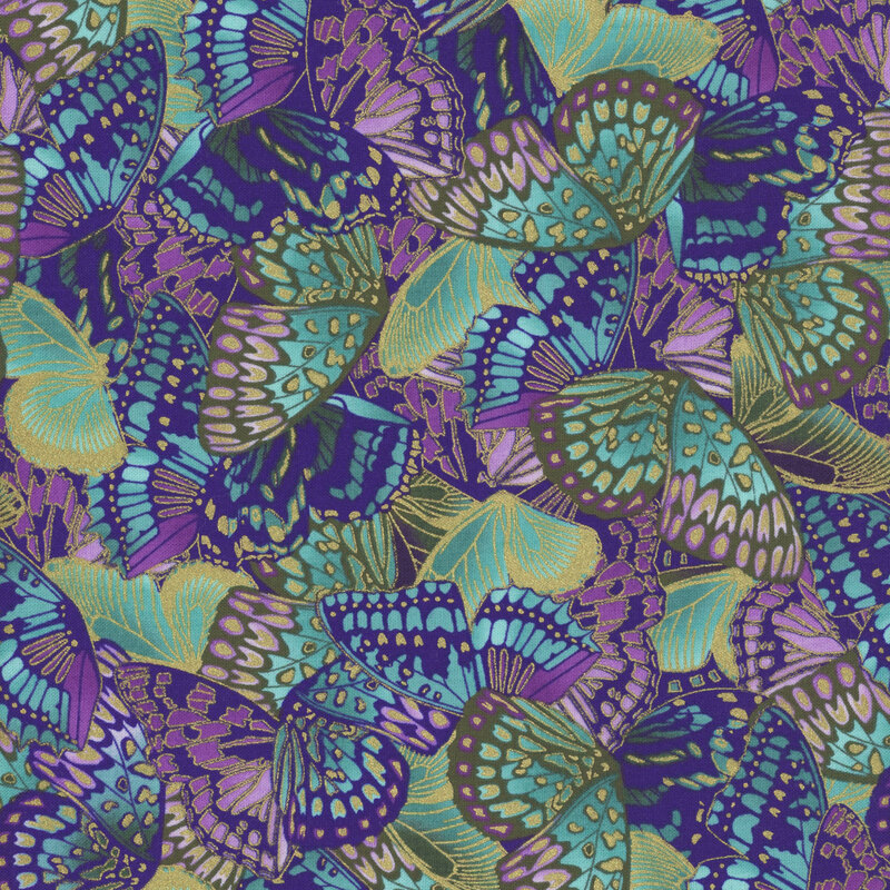 Colorful fabric with packed aqua, yellow, teal, and purple butterflies.