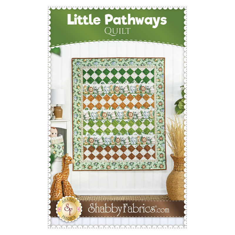 Front cover of the pattern showing the completed Little Pathways Quilt, colored in the Wee Safari collection in various earthy shades of green, brown, and blue.