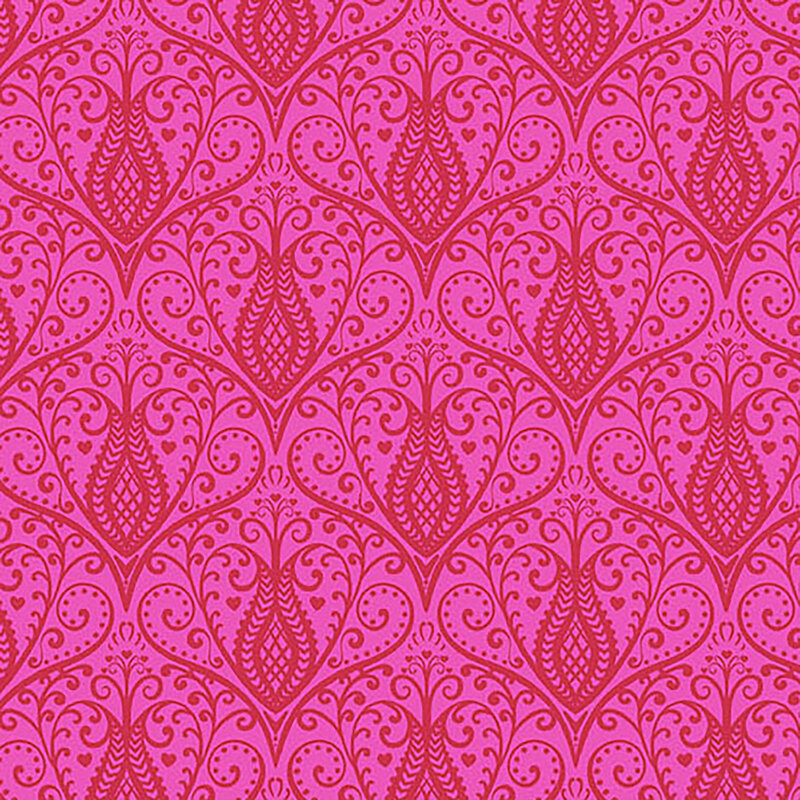 Bright pink fabric with damask like repeating designs of swirling florals