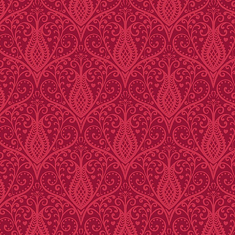 Tonal scarlet red fabric with damask like repeated red floral designs throughout