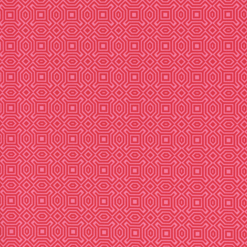 Tonal red fabric with a repeated maze like texture throughout