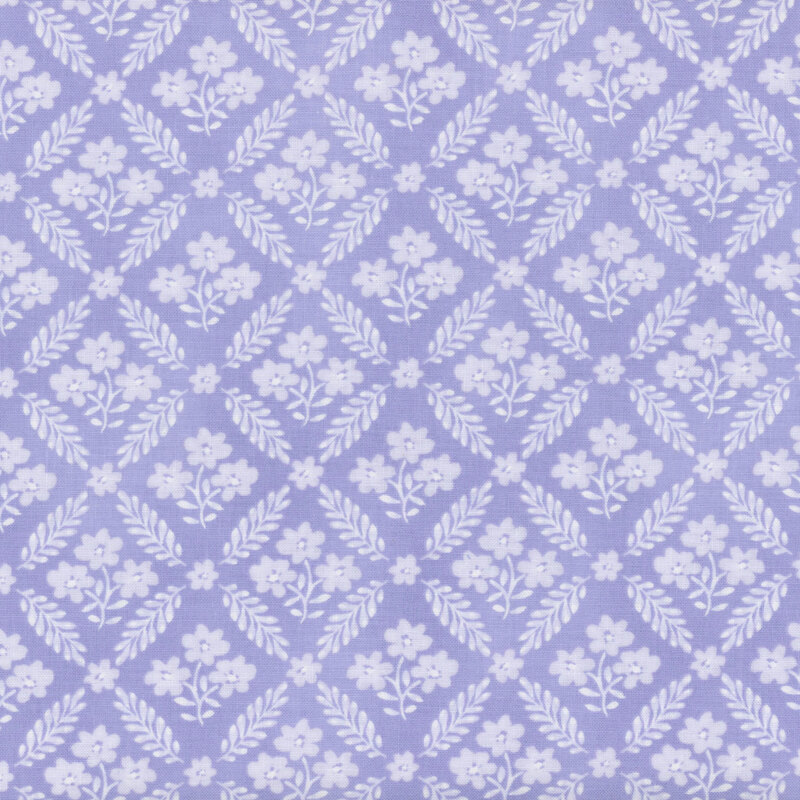 Purple fabric with a chain-link pattern made of leaves with small floral clusters in between each section.