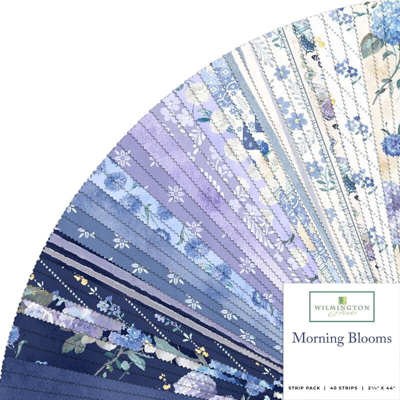 A fanned collage of navy, purple, and cream fabrics in the Morning Blooms collection