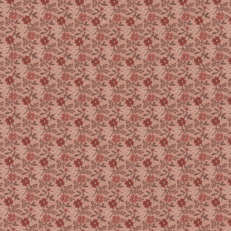 Light pink fabric featuring a pattern of pink and red florals