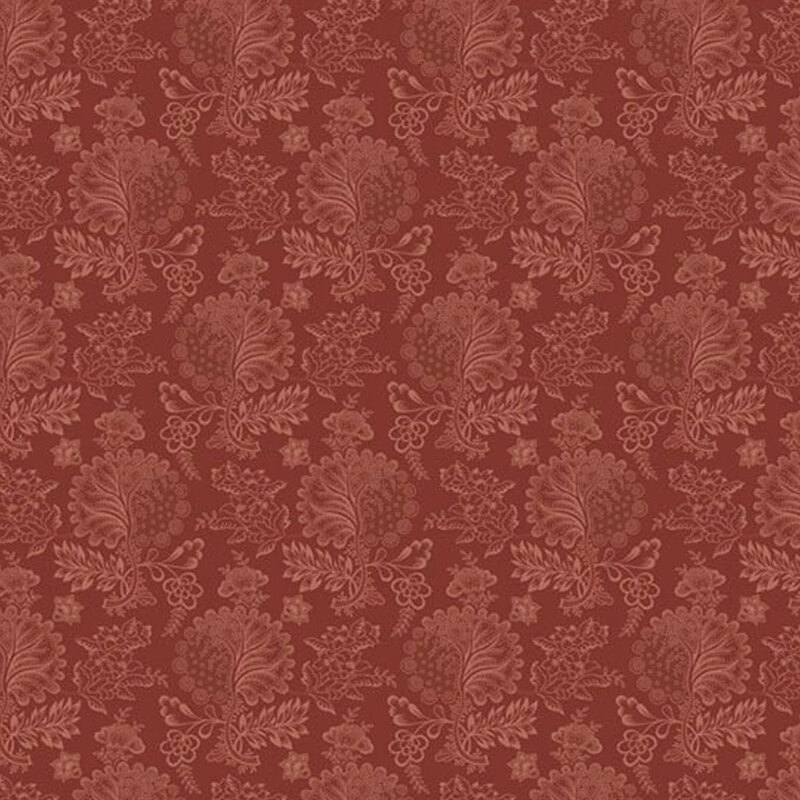 Tonal red fabric featuring florals and large intricate leaves